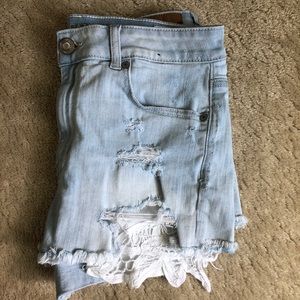 Ripped festival jean shorts